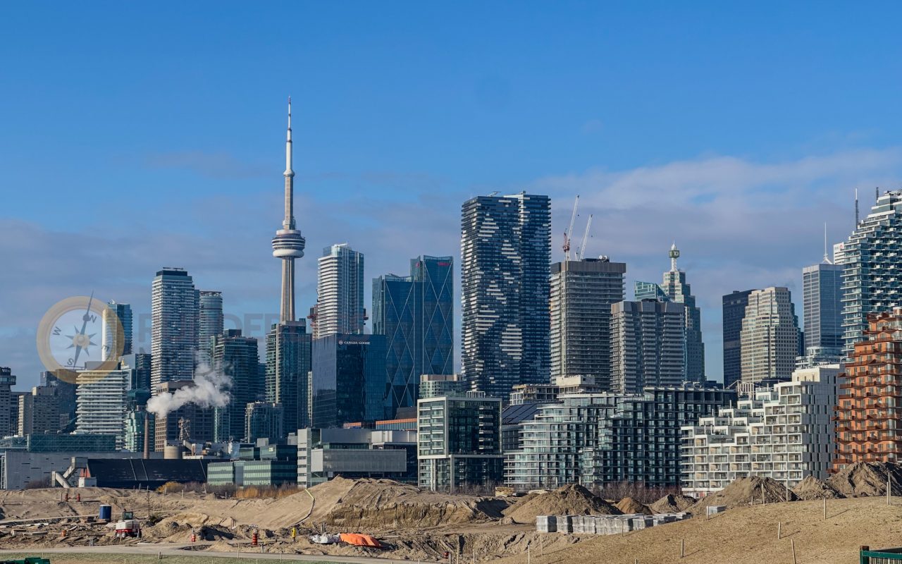 a city skyline with many tall buildings - best trails in toronto