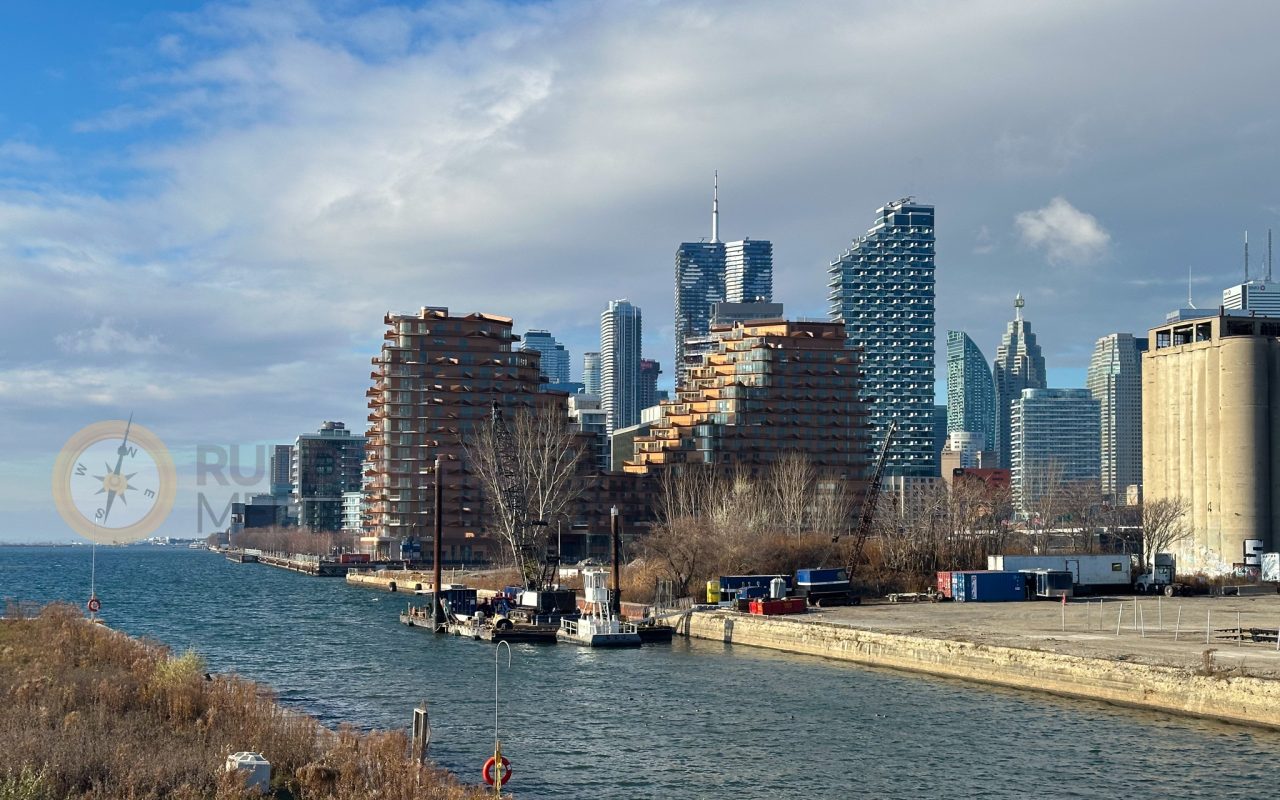 a river with a city in the background - best trails in toronto