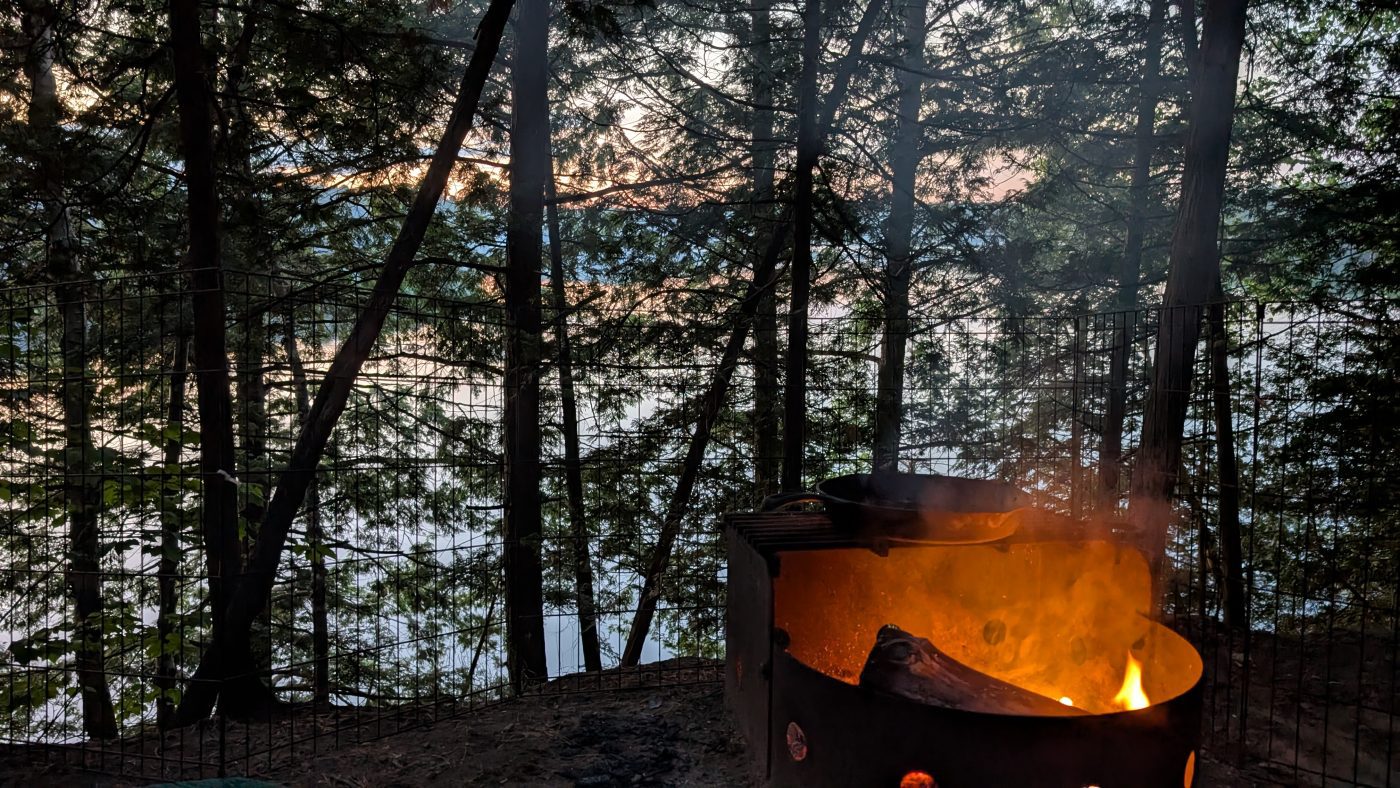northern ontario provincial parks - campfire at sunset at sharbot lake provincial park