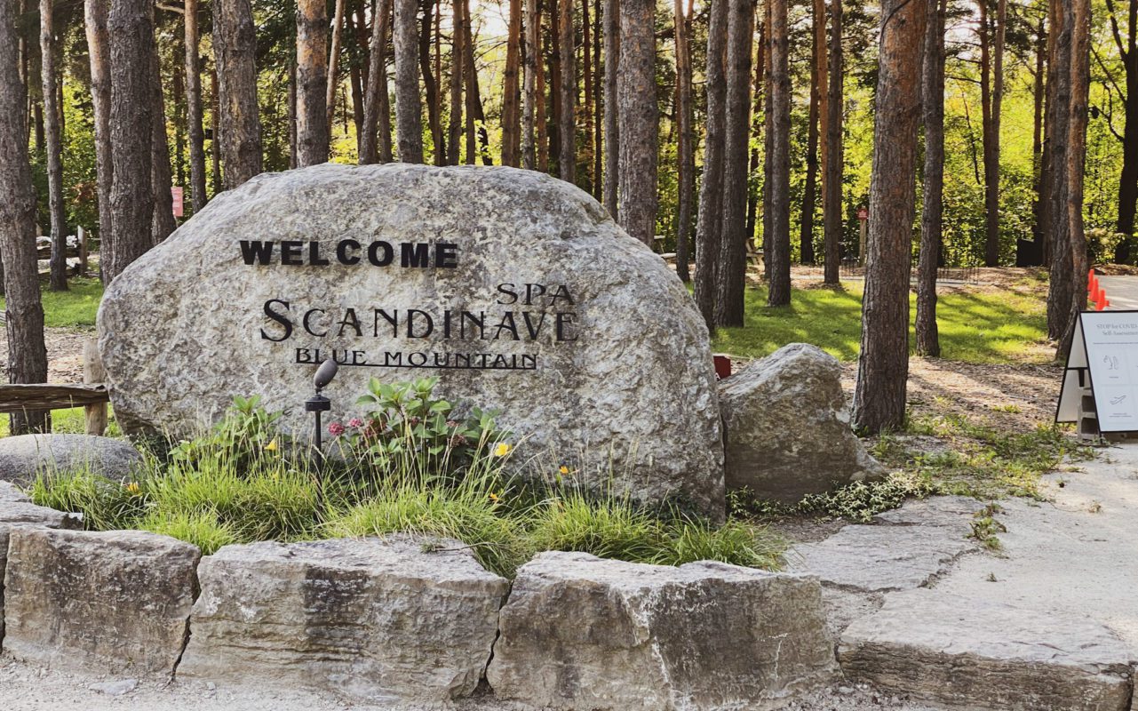the large rock sign for Spa Scandinave Blue Mountain | collingwood attractions
