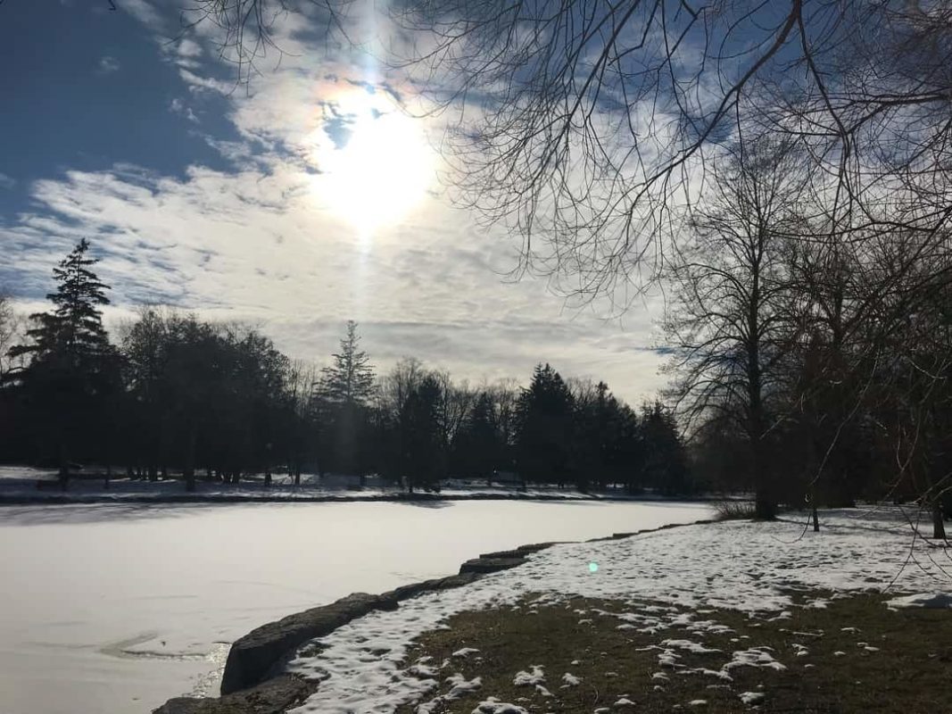 frozen river with snow on the ground | winter activities in ontario