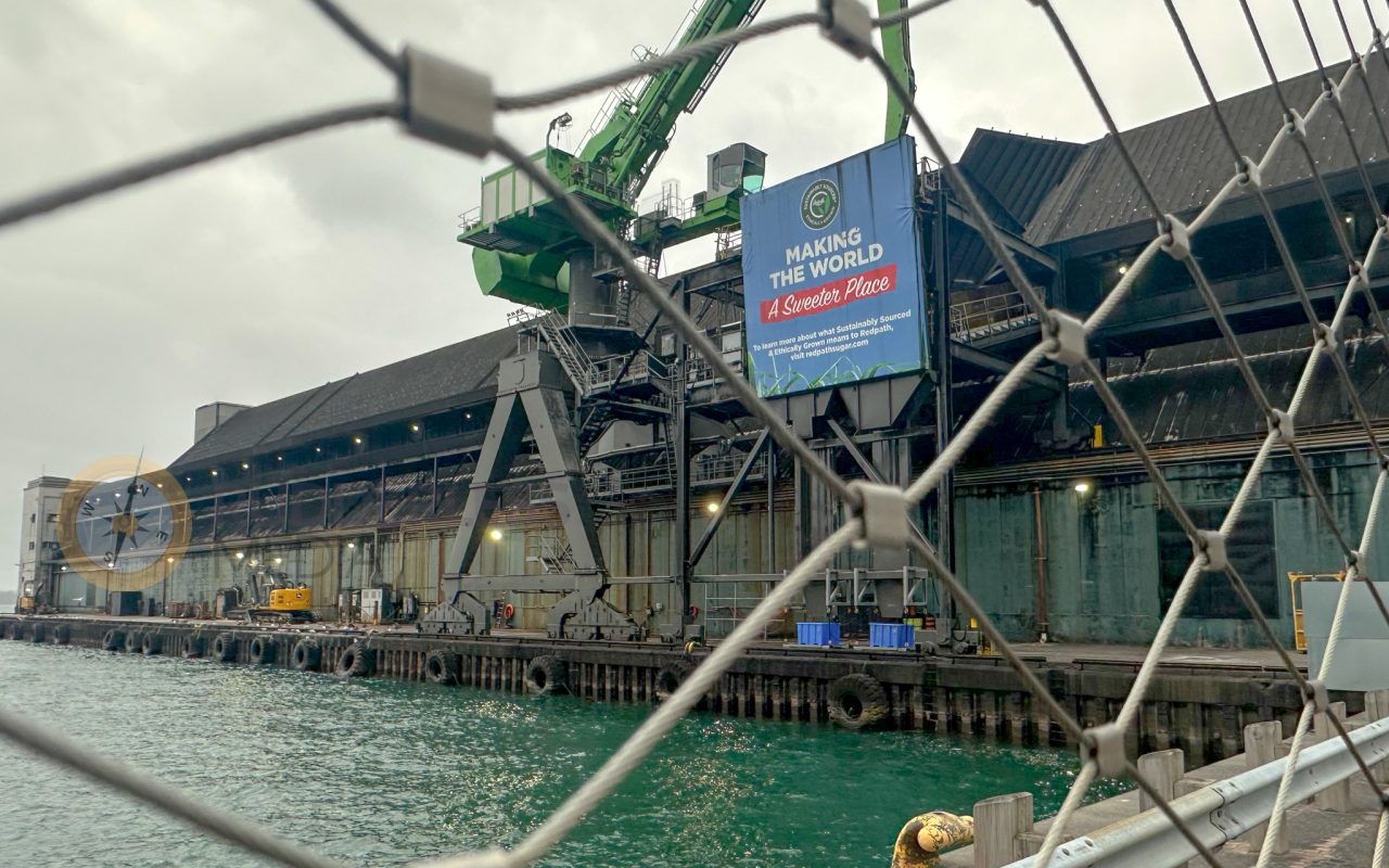 a large crane on a dock - martin goodman trail