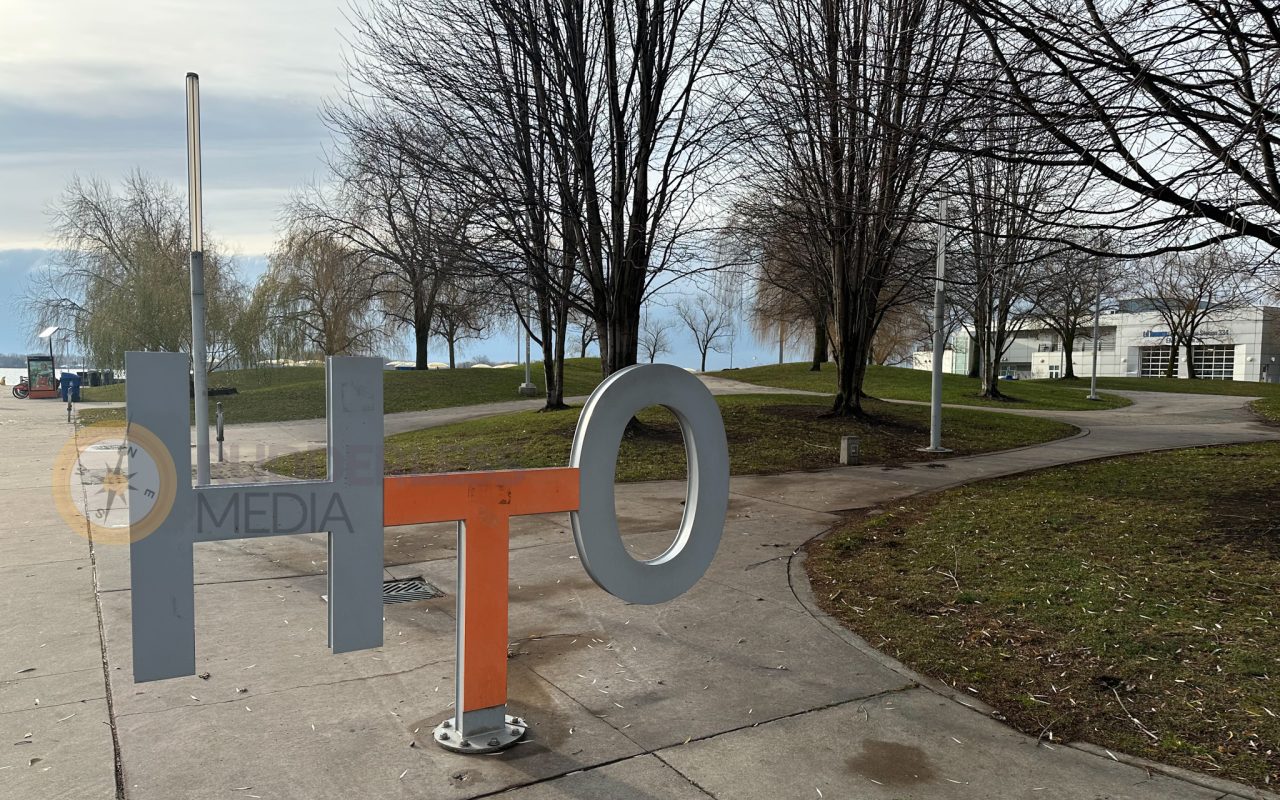 a sign on a sidewalk - martin goodman trail map
