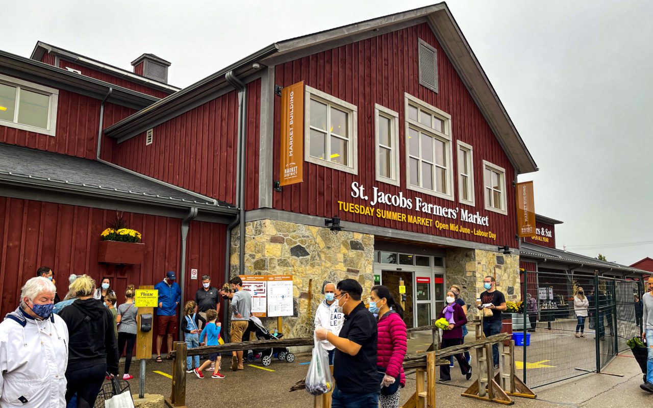 Several people entering the front doors of the St Jacobs Farmers' Market | st jacobs county