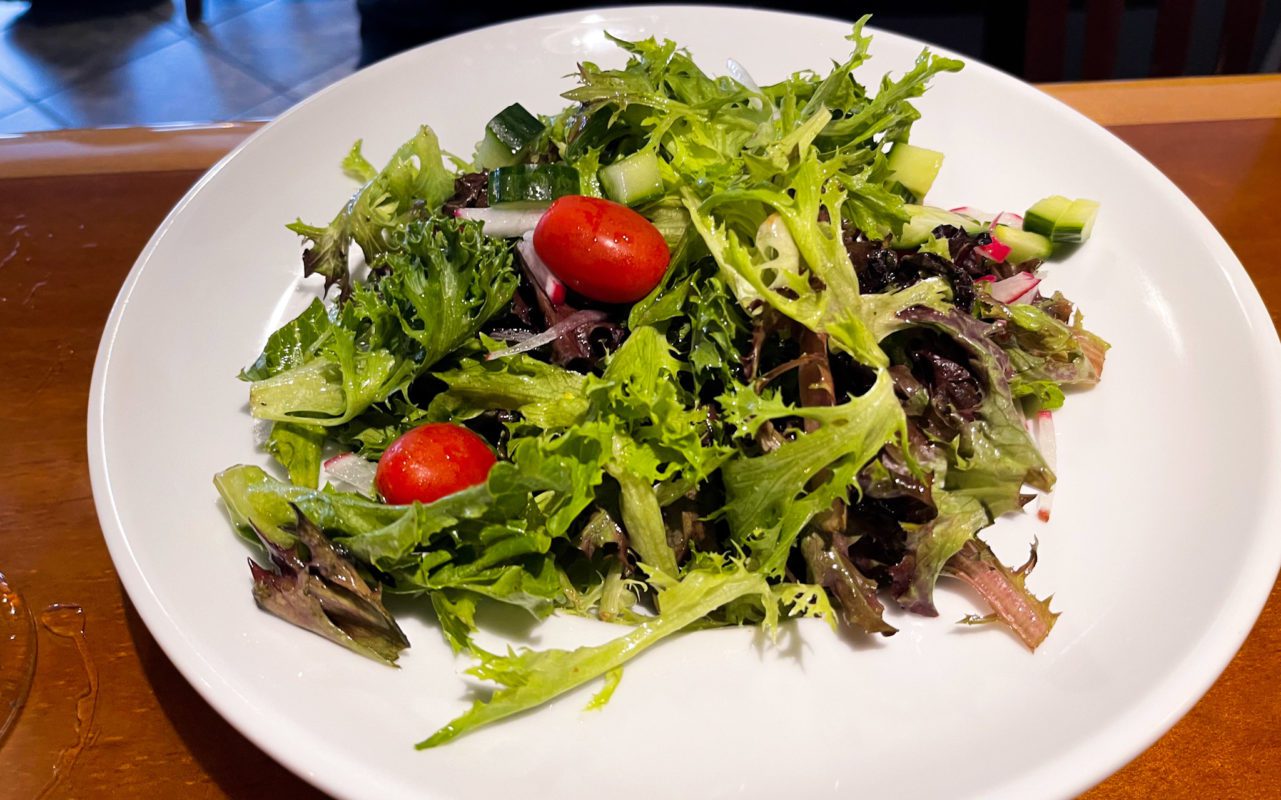 Salad on a white plate | st jacobs ontario