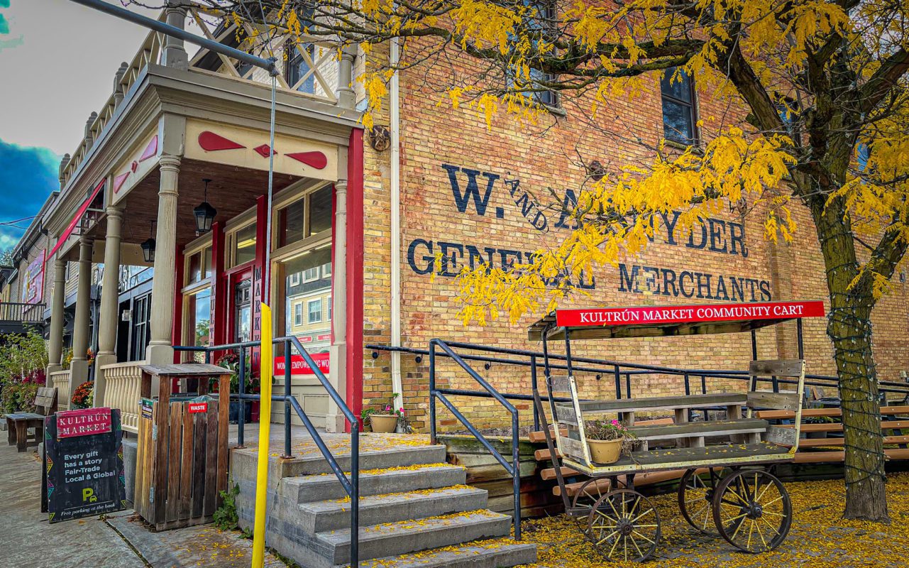 Side of a small town shop called the Kultrun Market with a market cart | things to do in saint jacobs