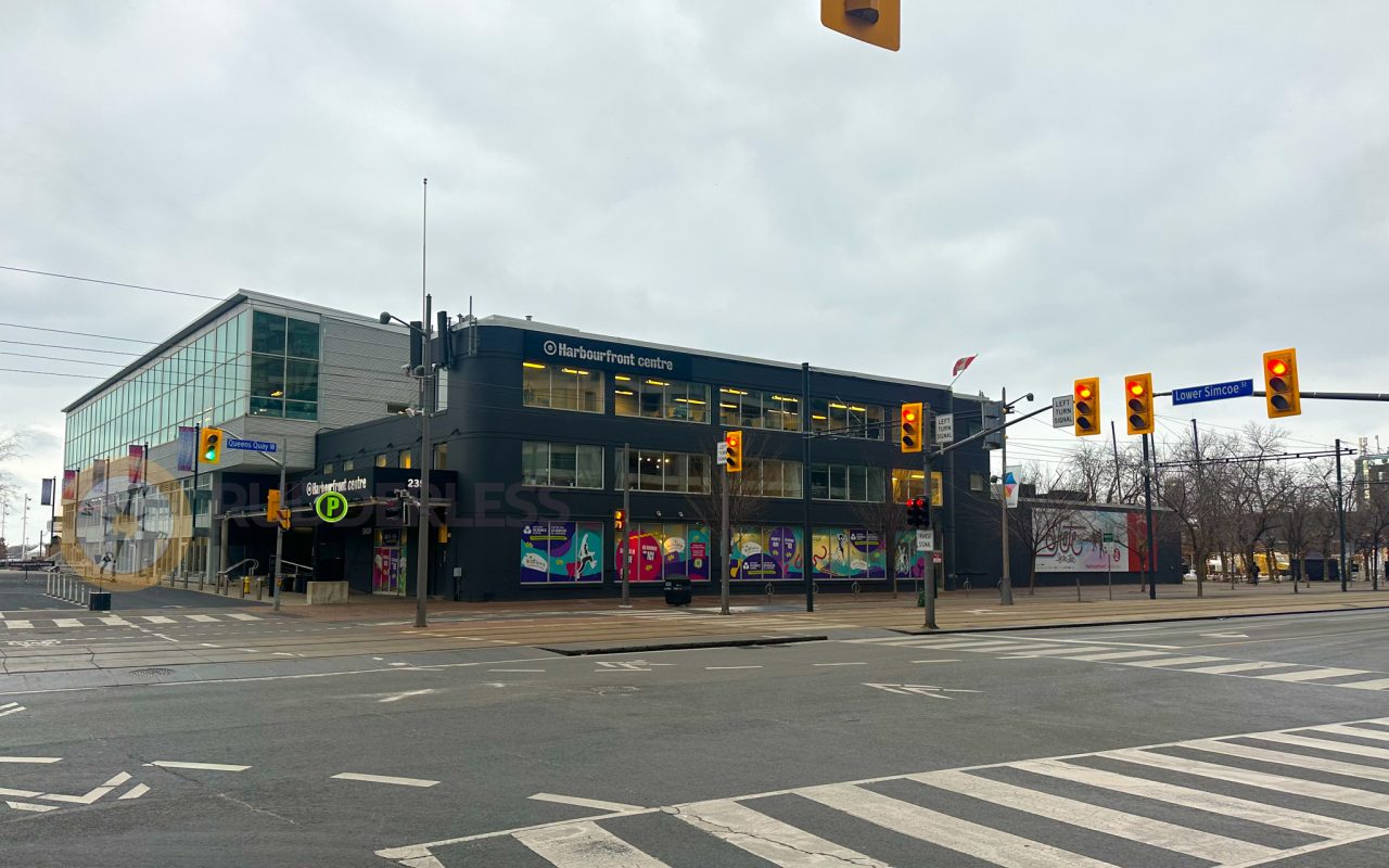 a building with many windows and a street light - waterfront trail toronto
