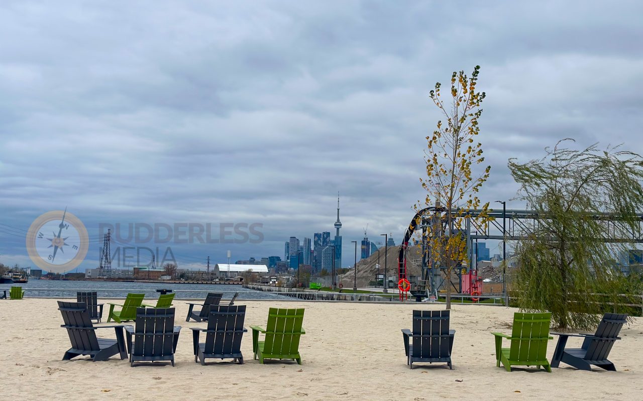 a group of chairs on a beach - who is martin goodman